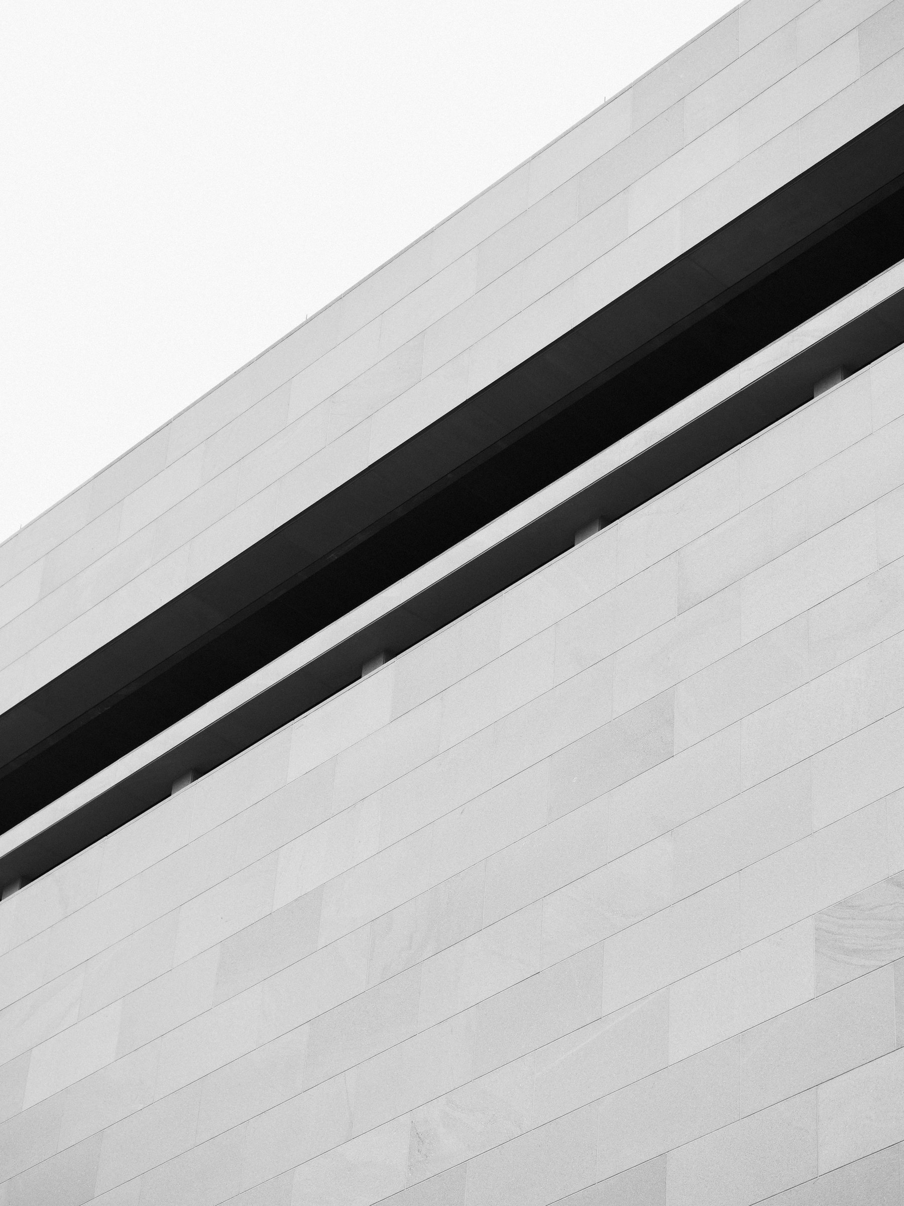 A stone facade in daylight