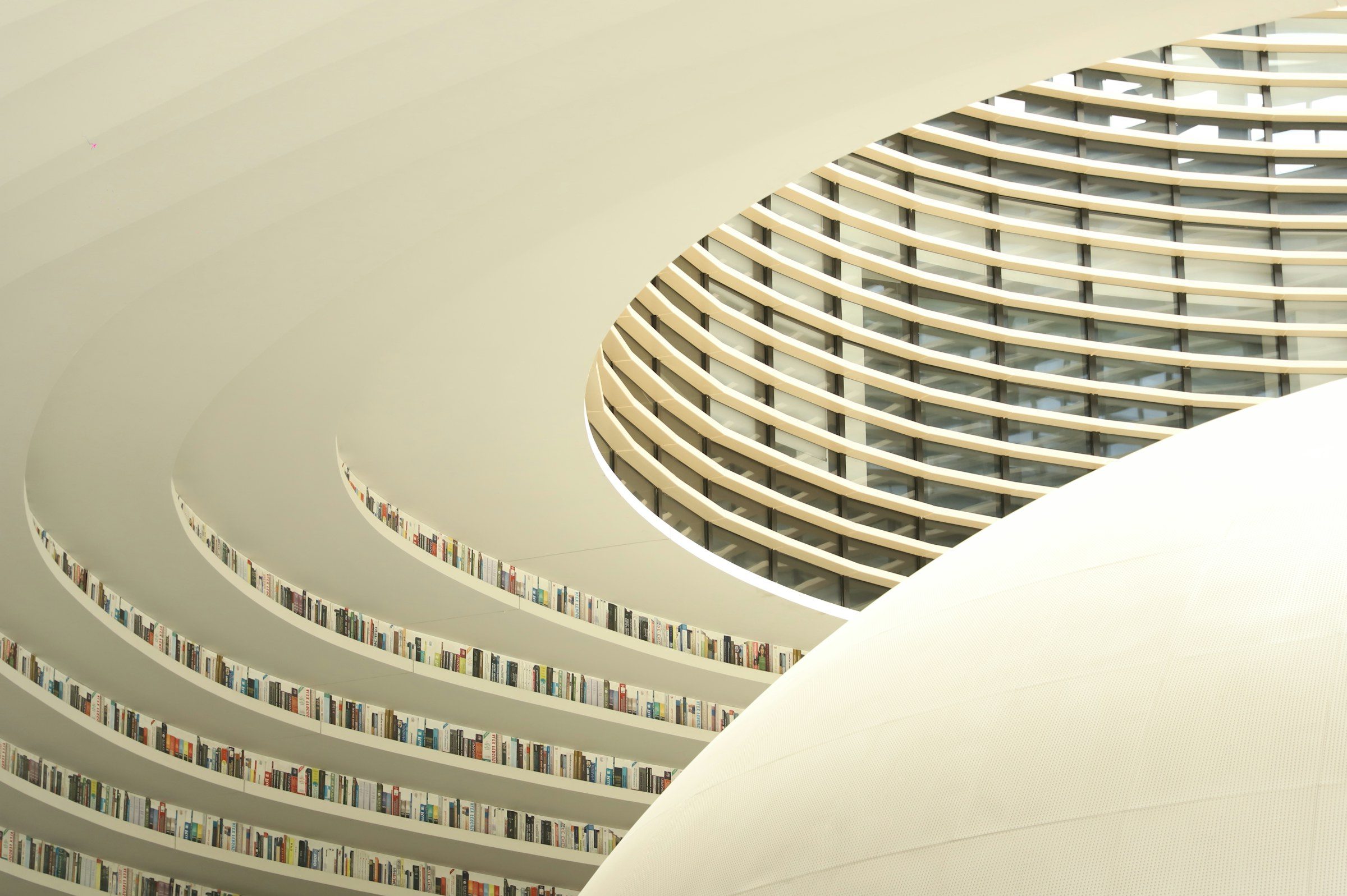 Curved tiers of a bright library